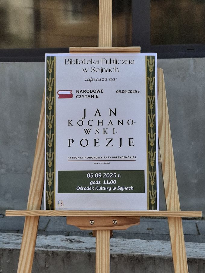 plakat na sztaludze i tekst biblioteka publiczna w sejnach zaprasza na narodowe czytanie jana kochanowskiego - poezje 05.09.2025 godz. 11:00 Osrodek Kultury w Sejnach